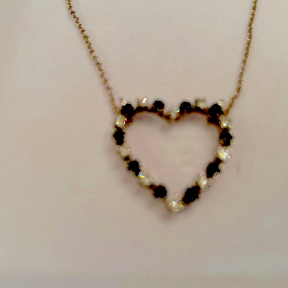 Heart of precious diamonds & sapphires.  Tiffany & Company purchased appraised